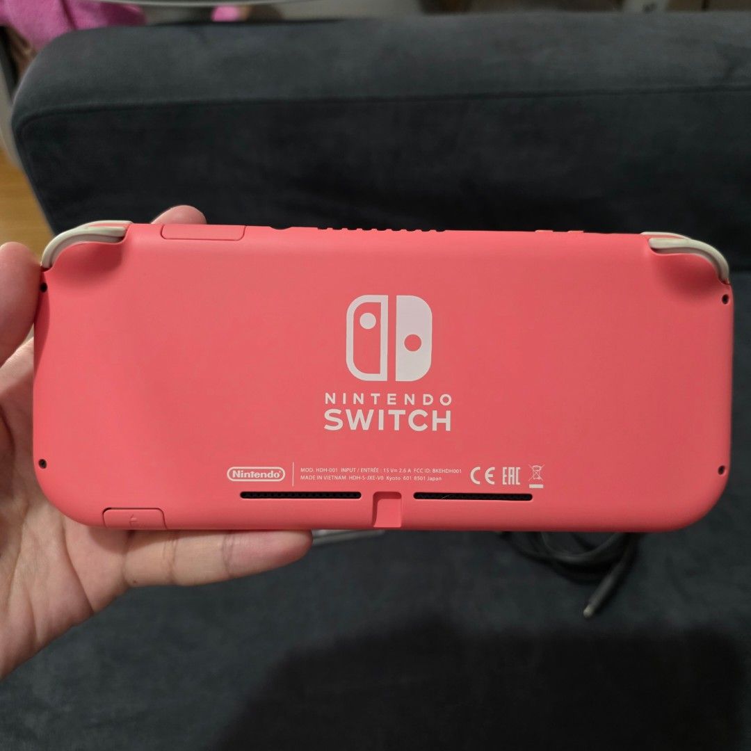 Nintendo Switch Lite Coral Pink (Category: Nintendo) located in Manila. Submitted by sweettotes_ph (Listing ID 1465843001, Image 3). Description: Coral Pink No issues Smooth Fully working Good condition With tempered glass With original charger No games or SD card included I have other games feel free to check my listings :) For pickup or delivery Bdo Gcash Maya Gotyme payment.