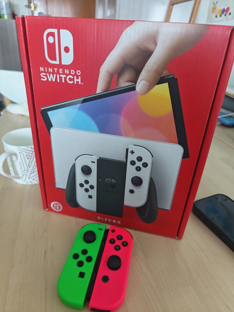 Nintendo Switch OLED 白色 連Splatoon手制 （分類：Nintendo 任天堂）位於 Hong Kong。 由 broscar 提交（商品編號 1465848066，圖片 1）。簡介： 新淨 100%work 齊件，連splatoon手制 交收或順豐到付。