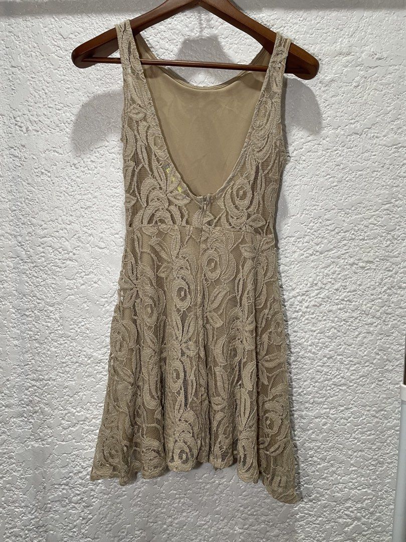 Nude lace dress (Category: Dresses) located in Paranaque City. Submitted by mansiii (Listing ID 1465834048, Image 2). Description: - has double lining - there’s a small hole but barely noticeable - double lining - low back design - has hidden zipper at the back.