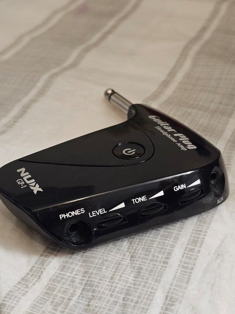 NUX GP-1 Guitar Plug Headphone Amp (Category: Musical Instruments) located in Manila. Submitted by awadennver (Listing ID 1465891256, Image 2). Description: ₱400 (with Free Batteries Included) 📍: Tagaytay City/Cavite (Pickup or Lalamove: at buyer's expense) (Check profile for other available music gear and pedals.) 🎧 NUX GP-1 Guitar Plug Headphone Amp: • Portable Silent Practice: Direct plug-in headphone amplifier for electric guitar. • Tone Co