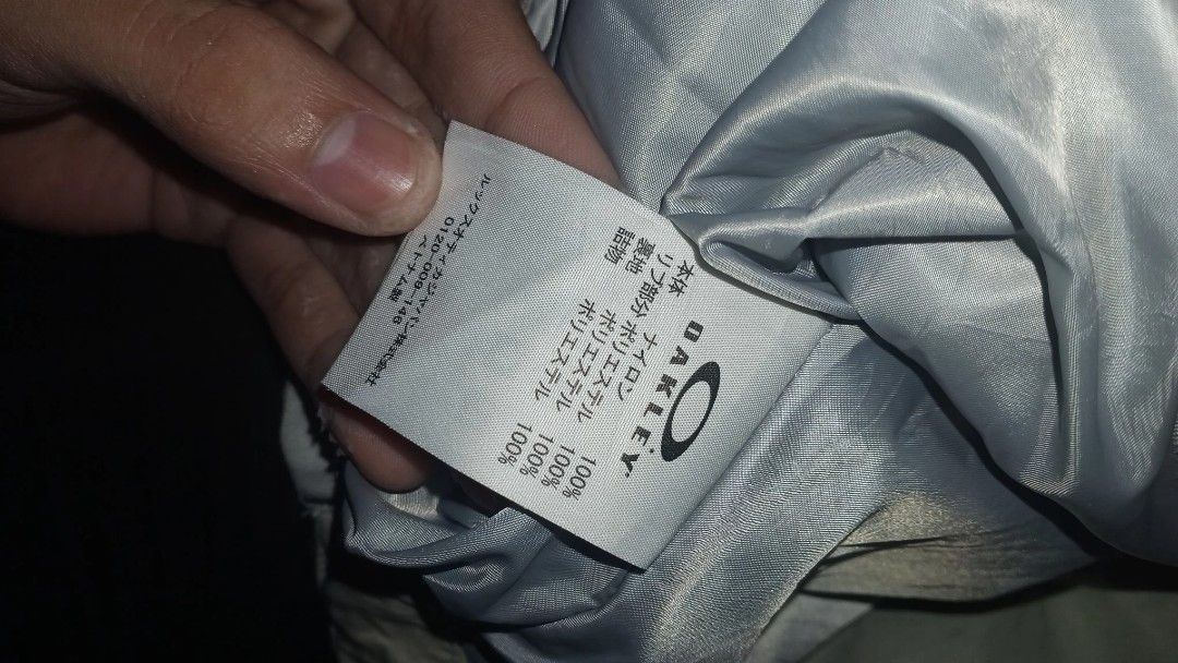 Oakley lightweight zip-up vest beige grey gorpcore (Category: Vests) located in Caloocan City. Submitted by janjanmalupit (Listing ID 1465831055, Image 3). Description: - Brand: Oakley - Color: Light grey beige - Material: 100% nylon body, polyester lining and filling - Features: Full-zip closure, multiple secure front zippered pockets, embroidered chest branding - Origin: Made in Vietnam - Style: Versatile layering piece for outdoor activities o