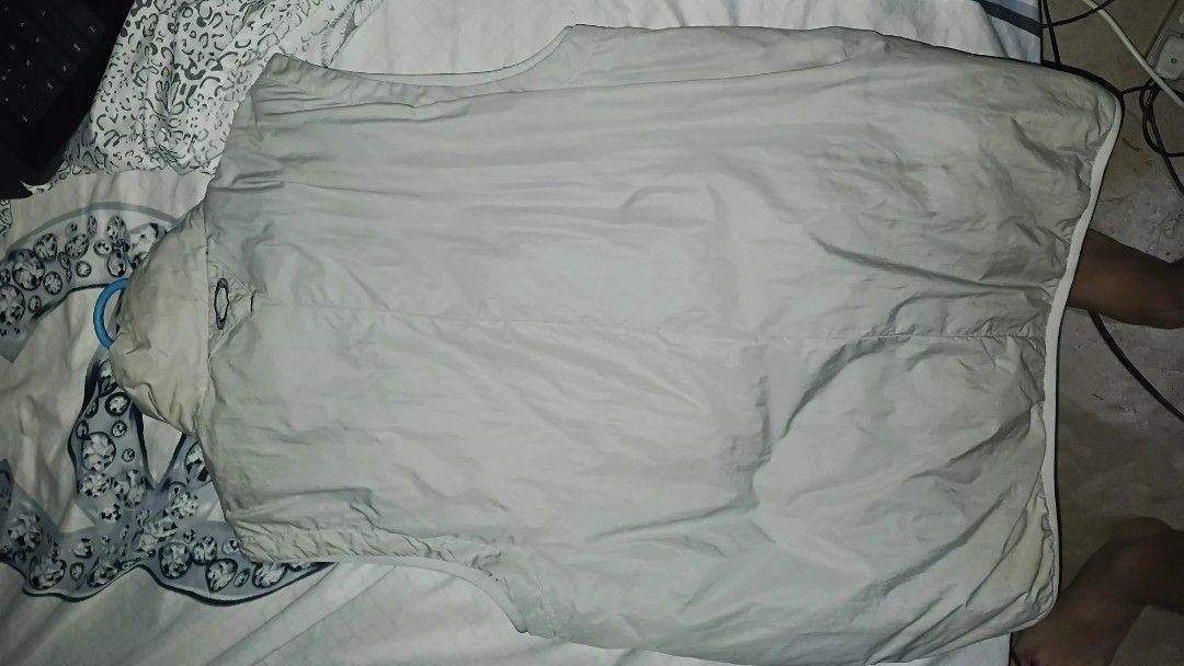 Oakley lightweight zip-up vest beige grey gorpcore (Category: Vests) located in Caloocan City. Submitted by janjanmalupit (Listing ID 1465831055, Image 2). Description: - Brand: Oakley - Color: Light grey beige - Material: 100% nylon body, polyester lining and filling - Features: Full-zip closure, multiple secure front zippered pockets, embroidered chest branding - Origin: Made in Vietnam - Style: Versatile layering piece for outdoor activities o