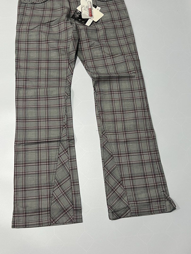 Oakley Plaid Thermal Pants (Category: Trousers) located in Caloocan City. Submitted by lostarchive_55 (Listing ID 1465916283, Image 3). Description: - Brand: Oakley - Condition: Brand new with original tags attached (includes Thermolite branding) - Size: 32 Waist - Design: Classic grey plaid check pattern with subtle red accents - Fit: Tailored flare cut at the bottom hems - Features: Button-closure back pockets, signature logo embroidery, and cl