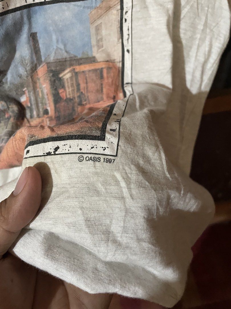 Oasis dated 1997 (Category: Tshirts & Polo Shirts ) located in New Bataan. Submitted by rebisa.404 (Listing ID 1465811334, Image 2). Description: Oasis dated 1997 Cut tag 23 width 30 length Need wash Issue nasa last pic minal discoloration.