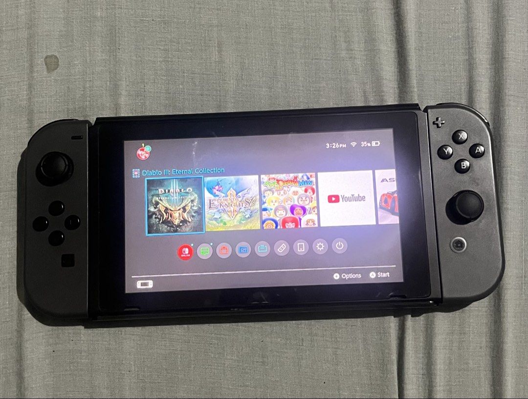 OG switch 1 with 128GB SD card (Category: Nintendo) located in Makati City. Submitted by mark.bacarro (Listing ID 1451044792, Image 2). Description: - Nintendo Switch console - Includes carrying case - Perfect for on-the-go gaming - Dock & Charger included - Great for entertainment .