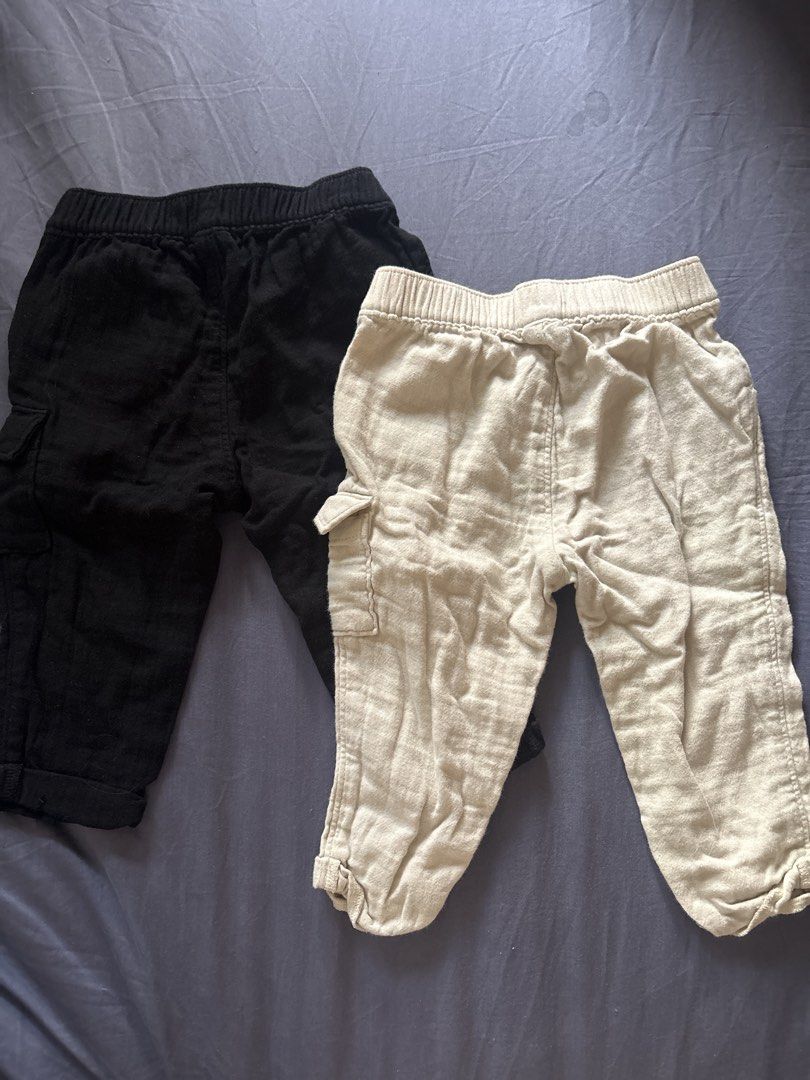 Old Navy Baby Cargo Pants 6-12M (Category: Babies & Kids Fashion) located in Taguig. Submitted by trashpalace_ (Listing ID 1465845682, Image 2). Description: Take 2 for 300 - Brand: Old Navy - Size: 6-12 months - Quantity: Bundle of 2 pairs (Black and Light Beige/Cream) - Features: Elastic waistband, decorative front buttons, and side cargo pockets - Material: Soft and lightweight - Condition: Great shape, clean, and ready to wear - Gender: Unise