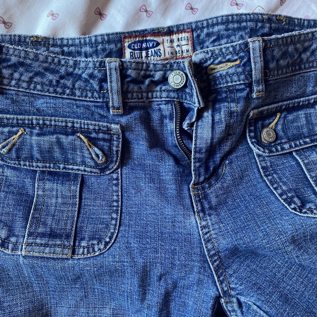 Old Navy Blue Jeans Cargo Pockets (Category: Jeans) located in Abulug. Submitted by dear_darlingdoll (Listing ID 1465876666, Image 2). Description: - Brand: Old Navy - Wash: Medium wash blue - Style: Y2K utility pants / straight leg cut - Waist: Mid-rise with button and zipper closure - Details: Trendy front cargo pockets - Material: Classic durable denim.