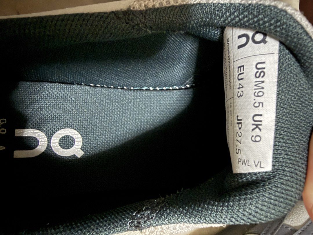 On Cloud Sneaker Men's Size US 9.5 (Category: Sneakers) located in Quezon City. Submitted by roundtree33 (Listing ID 1465920088, Image 3). Description: - Brand/Model: On Cloud Running Shoes - Colorway: Grey and white with lime green toggles and yellow outsole accents - Size: US 9.5 / UK 9 / EU 43 - Features: Signature quick-lacing system and Swiss engineering branding - Condition: Light wear visible on the soles, overall well-maintained No box.