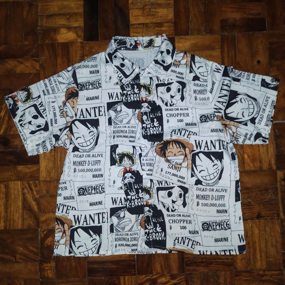 One Piece Wanted Poster Anime Button Up Shirt (Category: Tshirts & Polo Shirts ) located in Manila. Submitted by ekko_0xx (Listing ID 1465885149, Image 1). Description: - Design: All-over One Piece wanted poster manga print featuring Luffy, Zoro, Sanji, Chopper, and Brook - Style: Short sleeve button-up shirt with classic collared neckline and white buttons - Fit: Standard fit, lightweight and breathable fabric - Perfect for: Casual wear, anime c