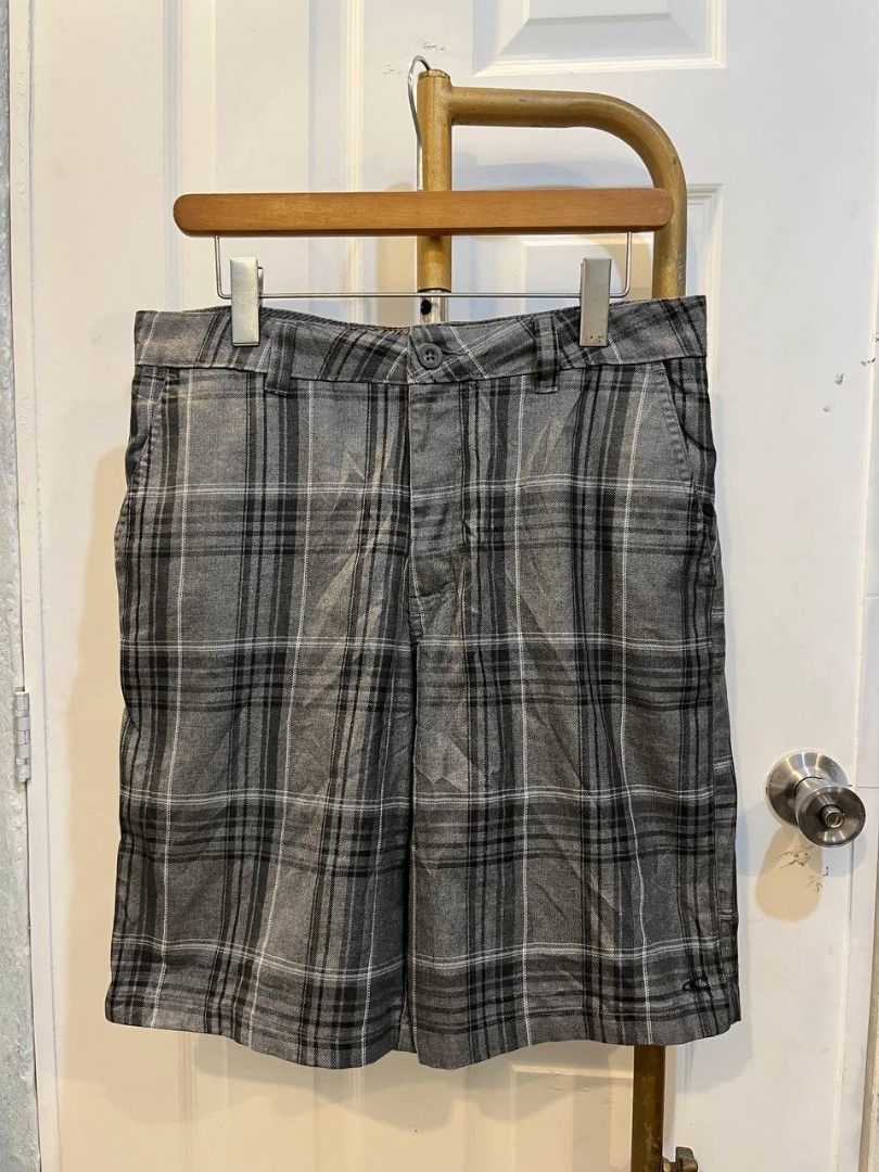 O'Neill Concha Grey Plaid Shorts Size 32 (Category: Shorts) located in Quezon City. Submitted by chicberry (Listing ID 1465762517, Image 1). Description: - Brand/Model: O'Neill Concha Plaid Shorts - Colorway: Grey, black, and white - Size: 32 waistband - Material: 70% polyester, 30% viscose blend - Details: Button closure on back pocket with embroidered logo - Care: Machine washable - Condition: Great casual style for warm weather.