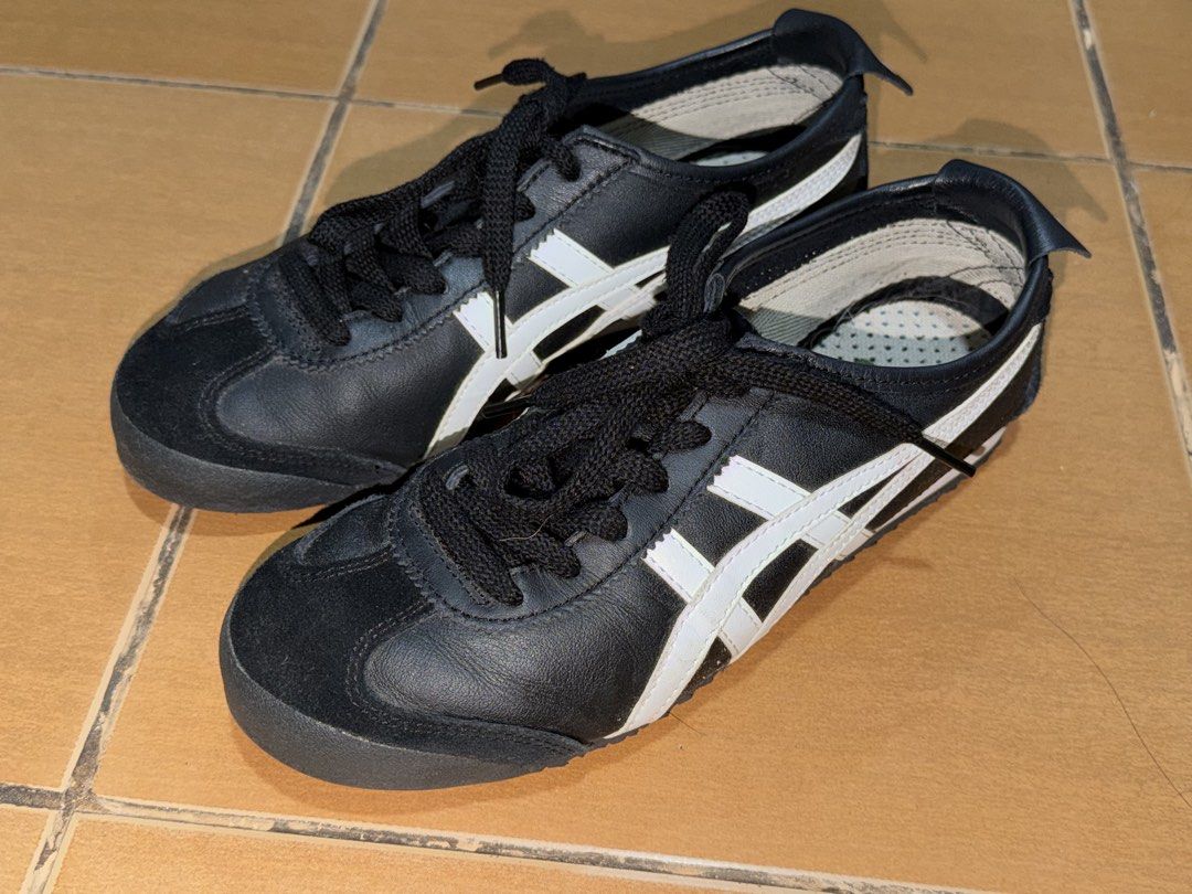 Onitsuka Tiger Mexico 66 Black White (Category: Sneakers) located in Manila. Submitted by laasty (Listing ID 1465858435, Image 1). Description: - uppers are in clean shape; soles show minor wear - size 5.5 but it fits if ur size 7 cos i'm size 7 rfs: not using it anymore, cant pull it off negotiable.