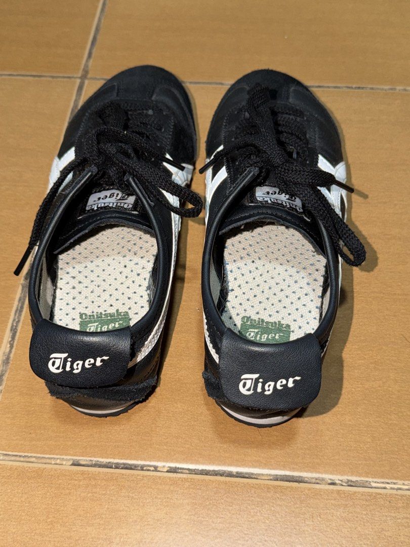 Onitsuka Tiger Mexico 66 Black White (Category: Sneakers) located in Manila. Submitted by laasty (Listing ID 1465858435, Image 3). Description: - uppers are in clean shape; soles show minor wear - size 5.5 but it fits if ur size 7 cos i'm size 7 rfs: not using it anymore, cant pull it off negotiable.