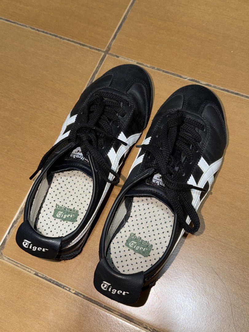 Onitsuka Tiger Mexico 66 Black White (Category: Sneakers) located in Manila. Submitted by laasty (Listing ID 1465858435, Image 2). Description: - uppers are in clean shape; soles show minor wear - size 5.5 but it fits if ur size 7 cos i'm size 7 rfs: not using it anymore, cant pull it off negotiable.