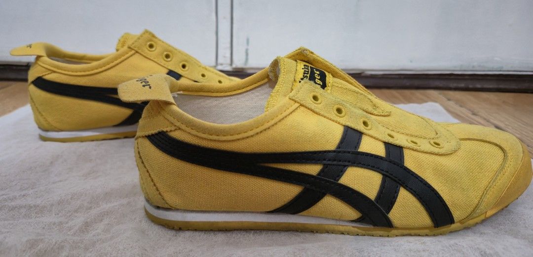 Onitsuka Tiger Slip-on (Category: Sneakers) located in Manila. Submitted by yoongi.zurc (Listing ID 1465853964, Image 2). Description: - Color: Yellow / Black - Size: US 5.5 / UK 4.5 / EUR 38 / CM 24.0 - no more box (i don't keep it) - rfs: decluttering.