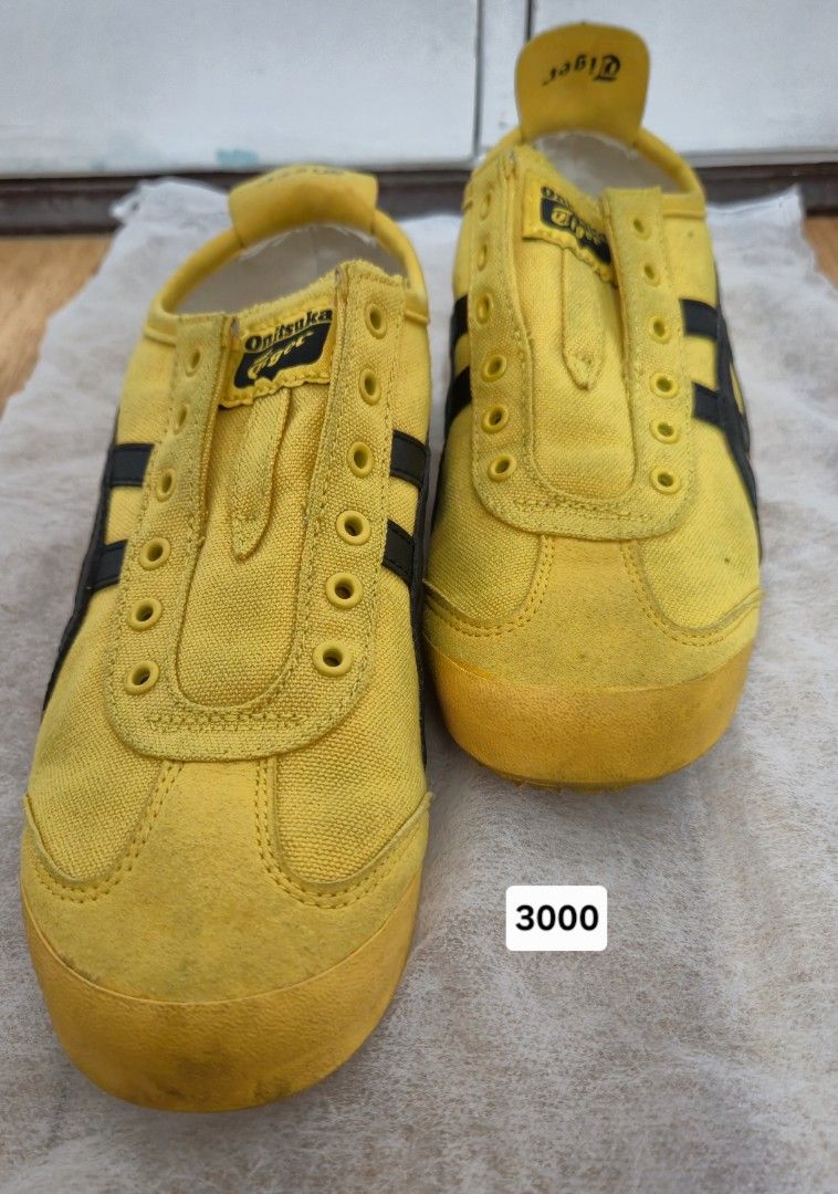 Onitsuka Tiger Slip-on (Category: Sneakers) located in Manila. Submitted by yoongi.zurc (Listing ID 1465853964, Image 1). Description: - Color: Yellow / Black - Size: US 5.5 / UK 4.5 / EUR 38 / CM 24.0 - no more box (i don't keep it) - rfs: decluttering.