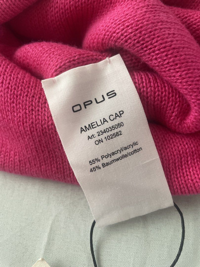 Opus Amelia Cap Beanie Red Pink (Category: Hats & Beanies) located in San Juan City. Submitted by redrosierose (Listing ID 1465809584, Image 3). Description: - Brand: Opus (Amelia cap) - Color: Red and pink - Design: Fold-over cuff with a small front metal logo tag - Material: 55% polyacrylic, 45% cotton blend - Condition: Brand new, unworn with original store tags attached (CHF 24.90 price tag) -Never use P500 + Shipping c/o buyer RFS: Declutter