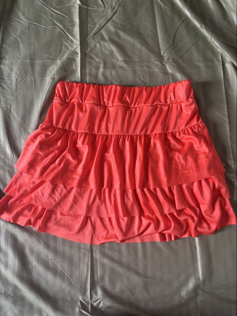 Orange Ruffled Tiered Mini Skirt (Category: Skirts) located in Binan City. Submitted by robeen_aguda (Listing ID 1465834466, Image 1). Description: orange tiered skirt with built in shorts. Brand new only tried once Rfs: for concert outfit but changed my mind. Will give freebies if sure buyer^^.
