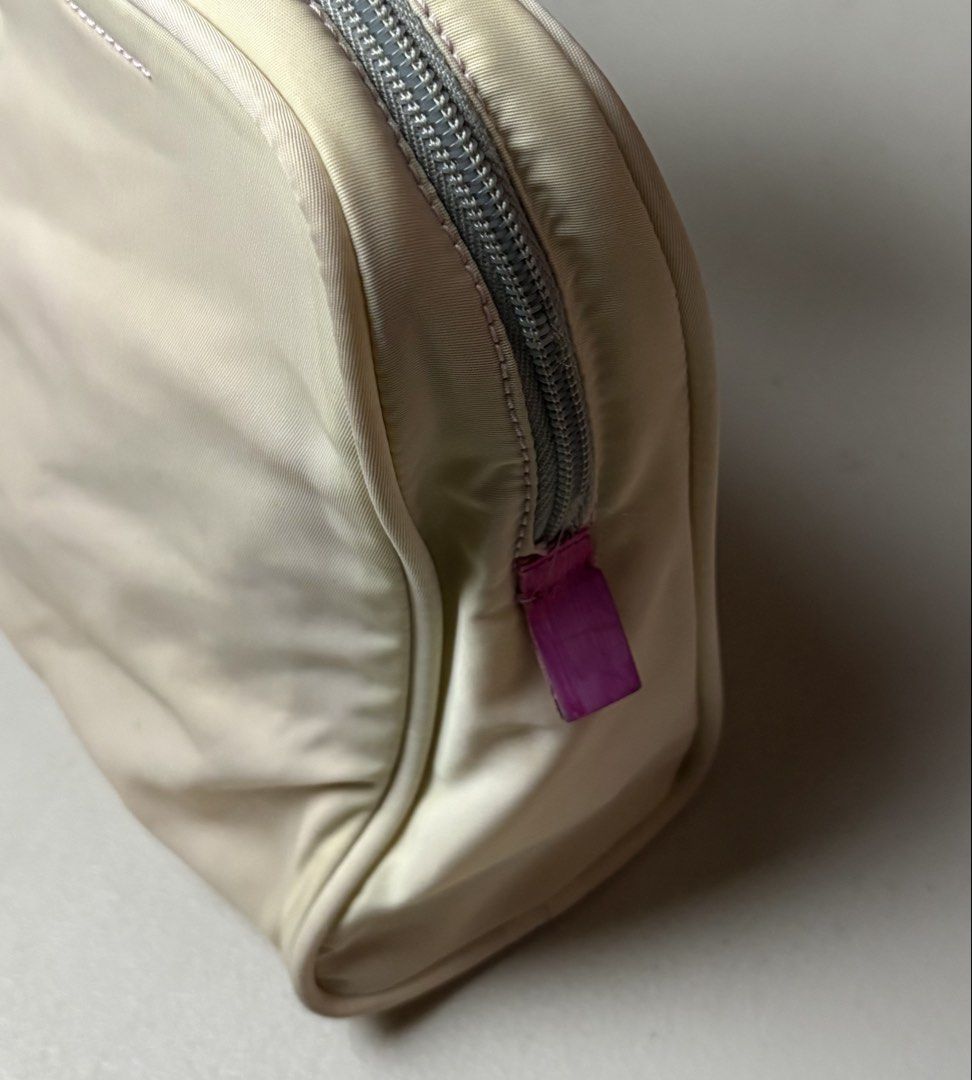Orig Prada Nylon Handbag Cream Pink (Category: Luxury Bags & Wallets) located in Manila. Submitted by hippiesph (Listing ID 1465935650, Image 2). Description: PRADA NYLON - HAND BAG / TOTE BAG Authentic CHECK DETAILS POSTED Price: 3k + sf Dm for more details 📩.
