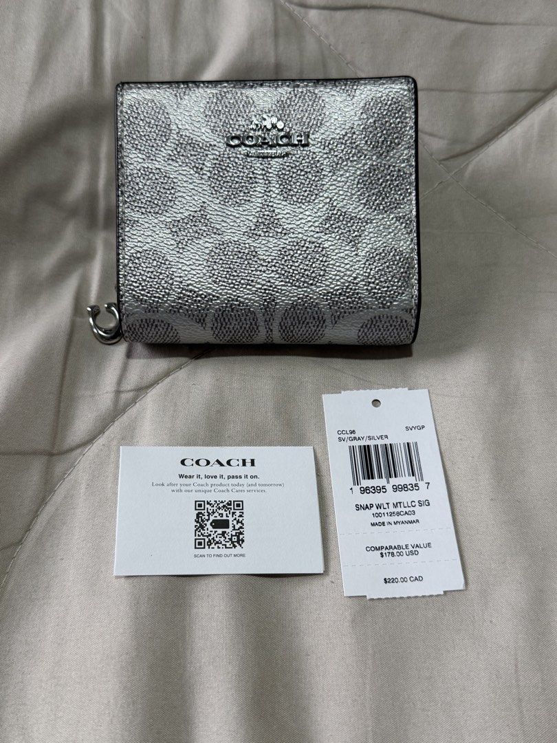 Original Coach Snap Wallet (Category: Wallets & Card holders) located in Marikina City. Submitted by welllovedbycarina (Listing ID 1465805756, Image 2). Description: 🩶 Guarantee original Coach Snap Wallet 🩶 Metallic Silver Color 🩶 Silver Hardwares 🩶 Comes with tag and care card only 🩶 Made in Myanmar 🩶 Ready to ship from Marikina City.