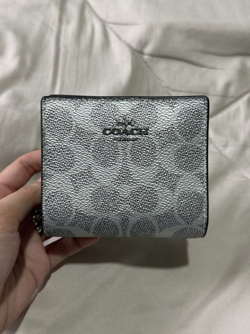 Original Coach Snap Wallet (Category: Wallets & Card holders) located in Marikina City. Submitted by welllovedbycarina (Listing ID 1465805756, Image 3). Description: 🩶 Guarantee original Coach Snap Wallet 🩶 Metallic Silver Color 🩶 Silver Hardwares 🩶 Comes with tag and care card only 🩶 Made in Myanmar 🩶 Ready to ship from Marikina City.
