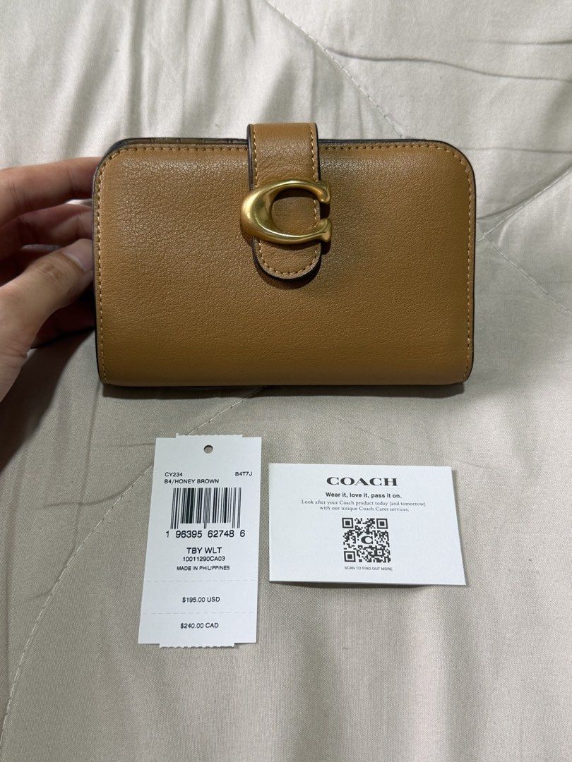 Original Coach Tabby Wallet (Category: Wallets & Card holders) located in Marikina City. Submitted by welllovedbycarina (Listing ID 1465806744, Image 3). Description: 🍯 Guaranteed original Coach 🍯 Tabby Wallet in Honey Brown color 🍯 Vintage gold hardwares 🍯 Comes with tag and care card only 🍯 No Coach paperbag 🍯 Ready to ship from Marikina City.