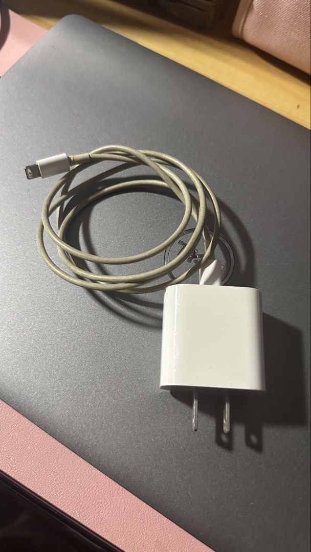 Original iPhone Lightning Cable (Category: Chargers & Cables) located in Manila. Submitted by nathaliag (Listing ID 1465945370, Image 1). Description: Extra charger only Adapter and cable bought separately for ₱2k total.