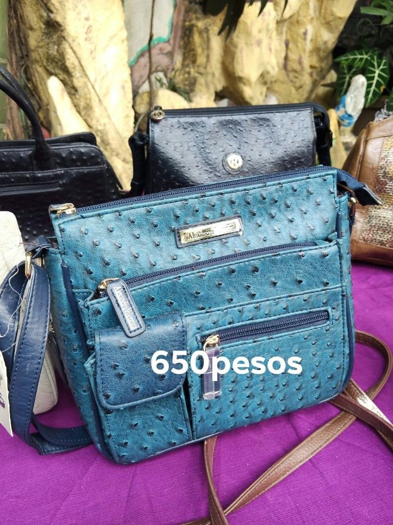 Ostrich Leather Textured Handbags Assorted Colors (Category: Tote Bags) located in Caloocan City. Submitted by kaymatias (Listing ID 1465937701, Image 2). Description: - Material: Ostrich leather texture - Styles: Totes, shoulder bags, and crossbodies - Colors: Teal blue, beige, yellow, black, brown, and red - Features: Multiple compartments and zippered pockets - Hardware: Sturdy handles and adjustable straps included on respective pieces - Pric