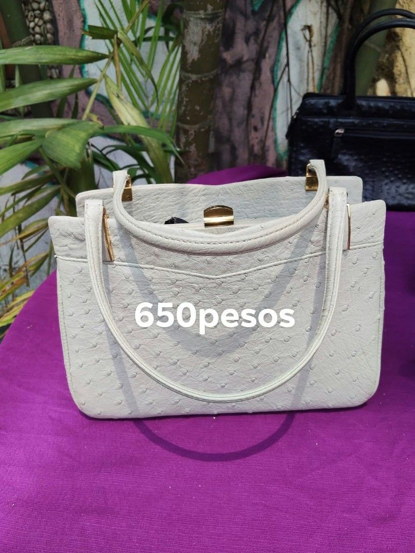 Ostrich Leather Textured Handbags Assorted Colors (Category: Tote Bags) located in Caloocan City. Submitted by kaymatias (Listing ID 1465937701, Image 3). Description: - Material: Ostrich leather texture - Styles: Totes, shoulder bags, and crossbodies - Colors: Teal blue, beige, yellow, black, brown, and red - Features: Multiple compartments and zippered pockets - Hardware: Sturdy handles and adjustable straps included on respective pieces - Pric