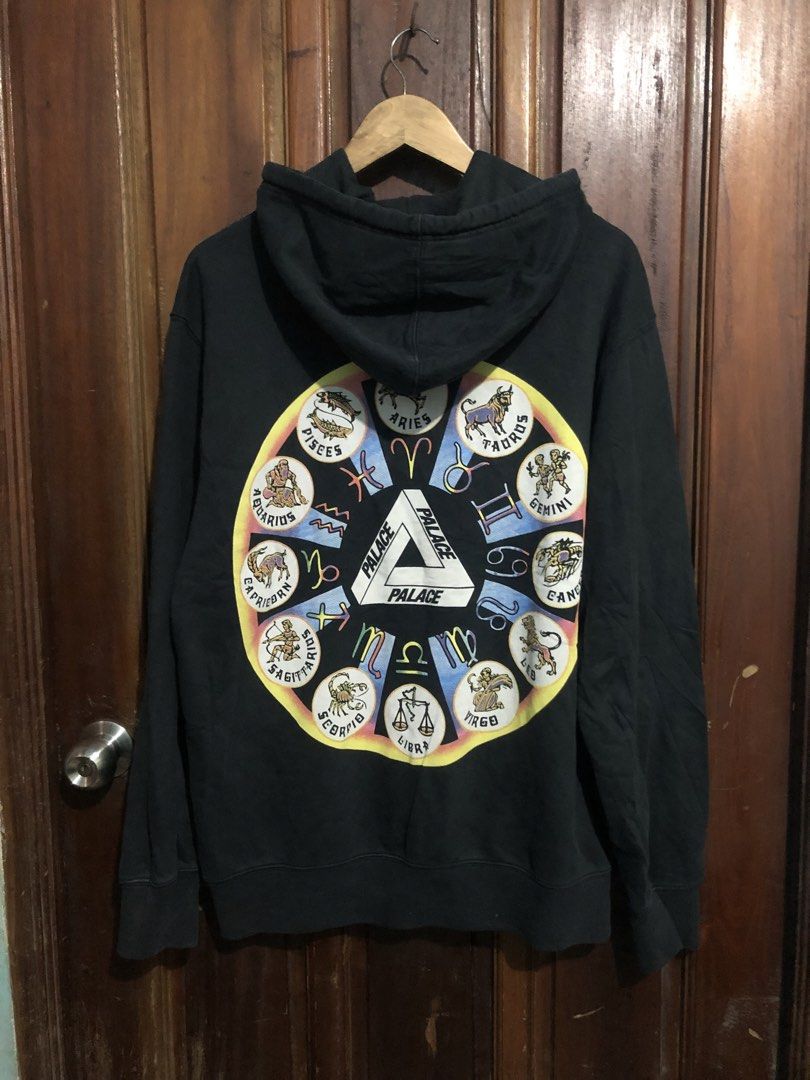 Palace Zodigac Hood Black (Category: Coats, Jackets and Outerwear) located in Quezon City. Submitted by yeahsource222 (Listing ID 1465947337, Image 2). Description: - Brand: Palace - Item: Zodigac Hood - Color: Black - Size: Medium - Material: 100% cotton - Design: Large zodiac wheel graphic on back, small tri-ferg logo on front chest - Features: Kangaroo pocket, drawstring hood, ribbed cuffs and hem - Condition: Slight wear from regular use, ple
