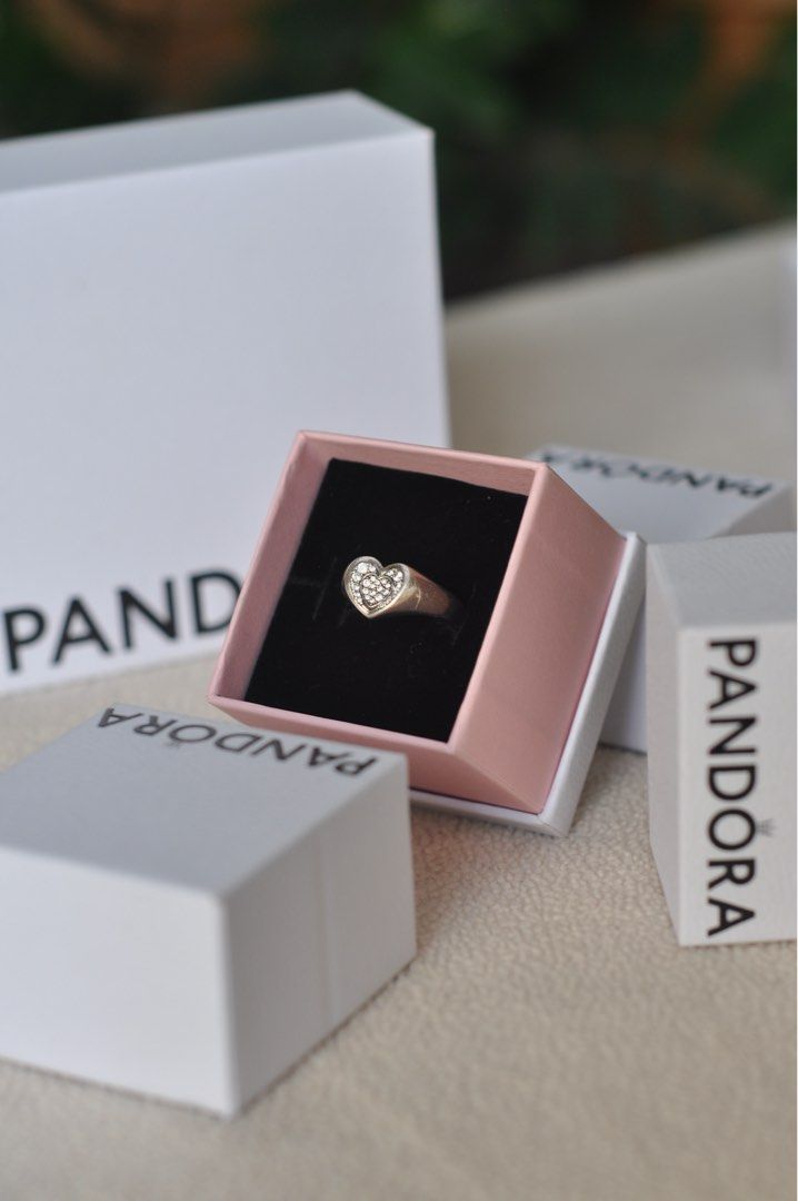 Pandora Signet Ring 52 and 54 (Category: Rings) located in Manila. Submitted by mayangmacaraig (Listing ID 1465883801, Image 1). Description: - Brand: Pandora - Model: Signet Ring with crystal-embellished heart design - Sizes available: 52 and 5 - Inclusions: Comes with original Pandora boxes as shown - Location: De La Salle Araneta University, Victoneta Ave, Malabon City.