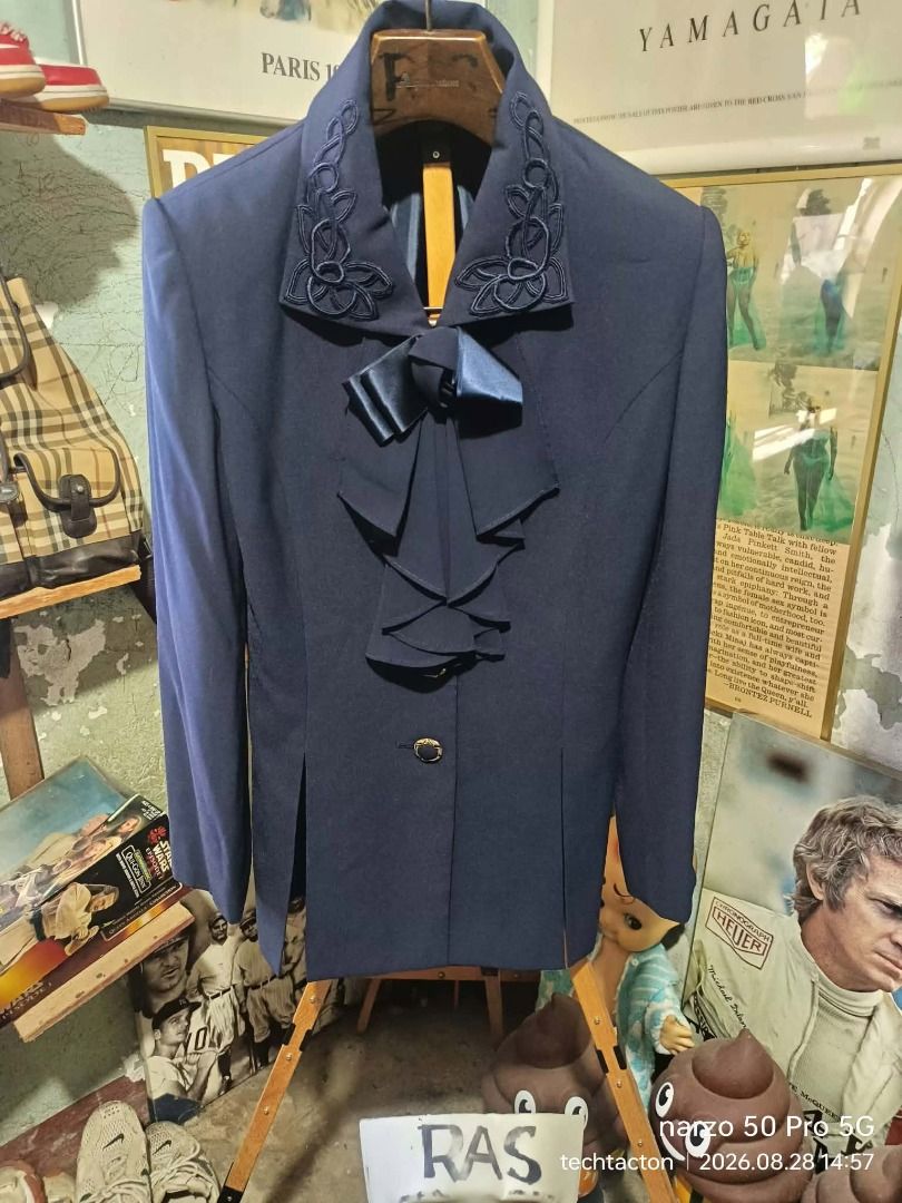 PARTINA FINE blazer (Category: Coats, Jackets and Outerwear) located in Santo Tomas. Submitted by pickers_corner (Listing ID 1465822902, Image 1). Description: PARTINA FINE blazer size 11 dime 19x27 made in Japan/ Japan Brand excellent no issue Made in Japan - Size: 11 AR - Material: 100% polyester (shell and lining) - Design Details: Detailed embroidery on both lapels, satin bow, and tiered ruffles down the front placket - Closure: Single gold-t