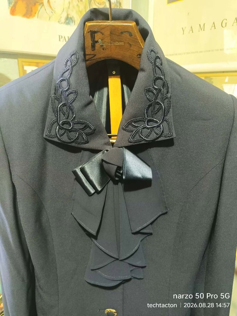 PARTINA FINE blazer (Category: Coats, Jackets and Outerwear) located in Santo Tomas. Submitted by pickers_corner (Listing ID 1465822902, Image 2). Description: PARTINA FINE blazer size 11 dime 19x27 made in Japan/ Japan Brand excellent no issue Made in Japan - Size: 11 AR - Material: 100% polyester (shell and lining) - Design Details: Detailed embroidery on both lapels, satin bow, and tiered ruffles down the front placket - Closure: Single gold-t