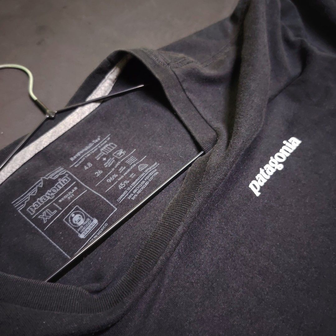 Patagonia Black Responsibili-Tee XL (Category: Tshirts & Polo Shirts ) located in General Santos City (Dadiangas). Submitted by angelodemegilloceballos (Listing ID 1465835292, Image 3). Description: -Pm me for more details & measurements - Brand: Patagonia - Size: XL (Regular Fit) - Color: Black - Design: Small white logo on chest, large colorful mountain graphic on back - Material: 50% recycled cotton, 50% recycled polyester - Condition: Soft, c