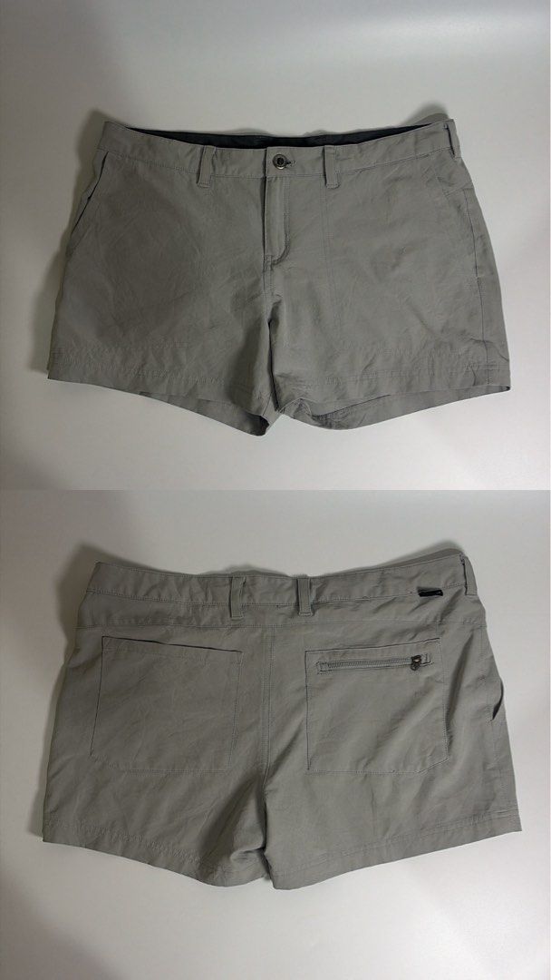 Patagonia hiking shorts (Category: Shorts) located in Carmona. Submitted by camille.02 (Listing ID 1465782564, Image 2). Description: - Color: Grey - Material: Lightweight and breathable fabric - Pockets: Standard front pockets, two large back patch pockets, and an extra secure zip pocket on the right - Closure: Button closure with zippered fly and belt loops - Versatile use: Ideal for outdoor activities and casual daily wear.