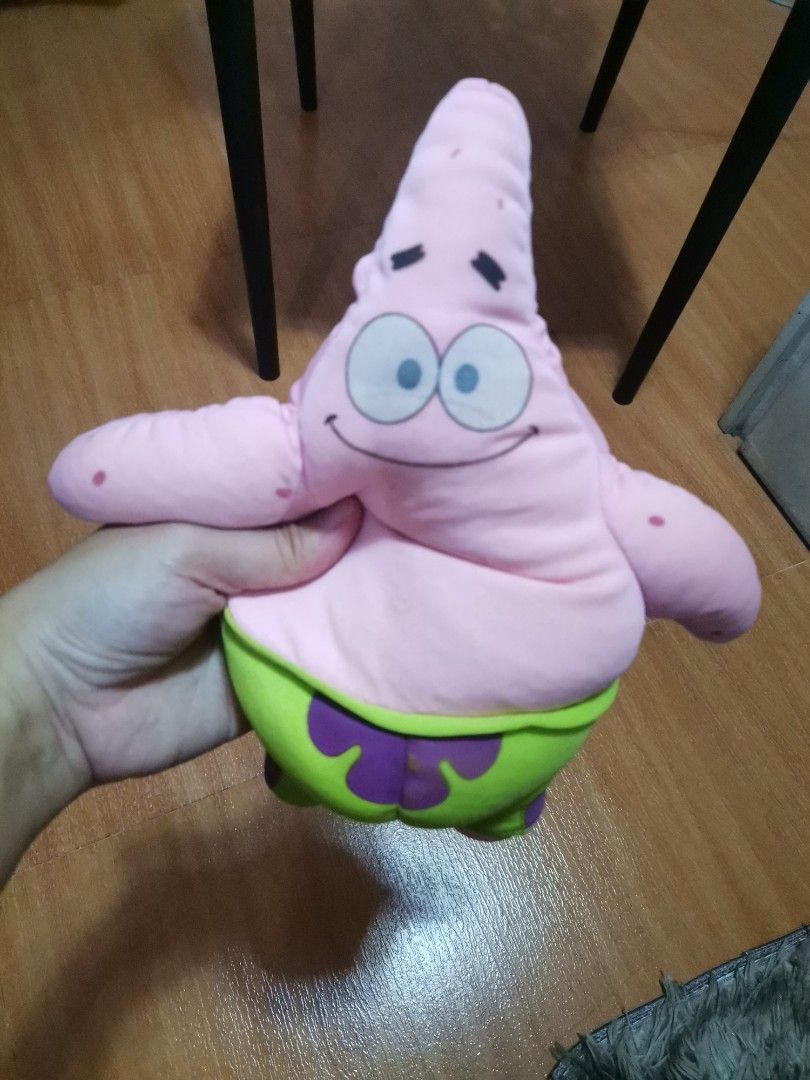 Patrick Star SpongeBob SquarePants plush toy stuffed doll (Category: Plushies & Soft Toys) located in Makati City. Submitted by kookybearsstuff (Listing ID 1465889543, Image 1). Description: - Item: Patrick Star plush toy (Medium handheld size) - Design: Pink starfish with green and purple shorts - Material: Soft fabric and stuffing - Condition: Pre-loved - Perfect for SpongeBob fans looking for a budget-friendly buddy or a quick DIY repair proje