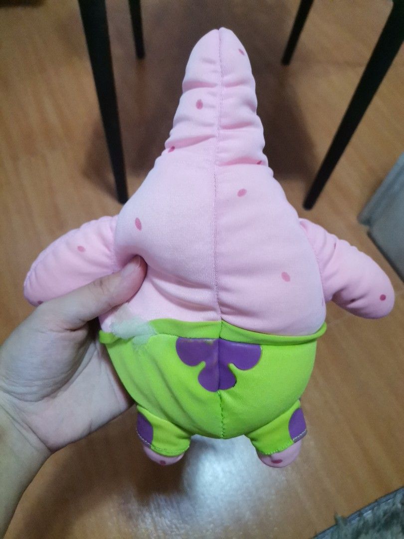 Patrick Star SpongeBob SquarePants plush toy stuffed doll (Category: Plushies & Soft Toys) located in Makati City. Submitted by kookybearsstuff (Listing ID 1465889543, Image 2). Description: - Item: Patrick Star plush toy (Medium handheld size) - Design: Pink starfish with green and purple shorts - Material: Soft fabric and stuffing - Condition: Pre-loved - Perfect for SpongeBob fans looking for a budget-friendly buddy or a quick DIY repair proje