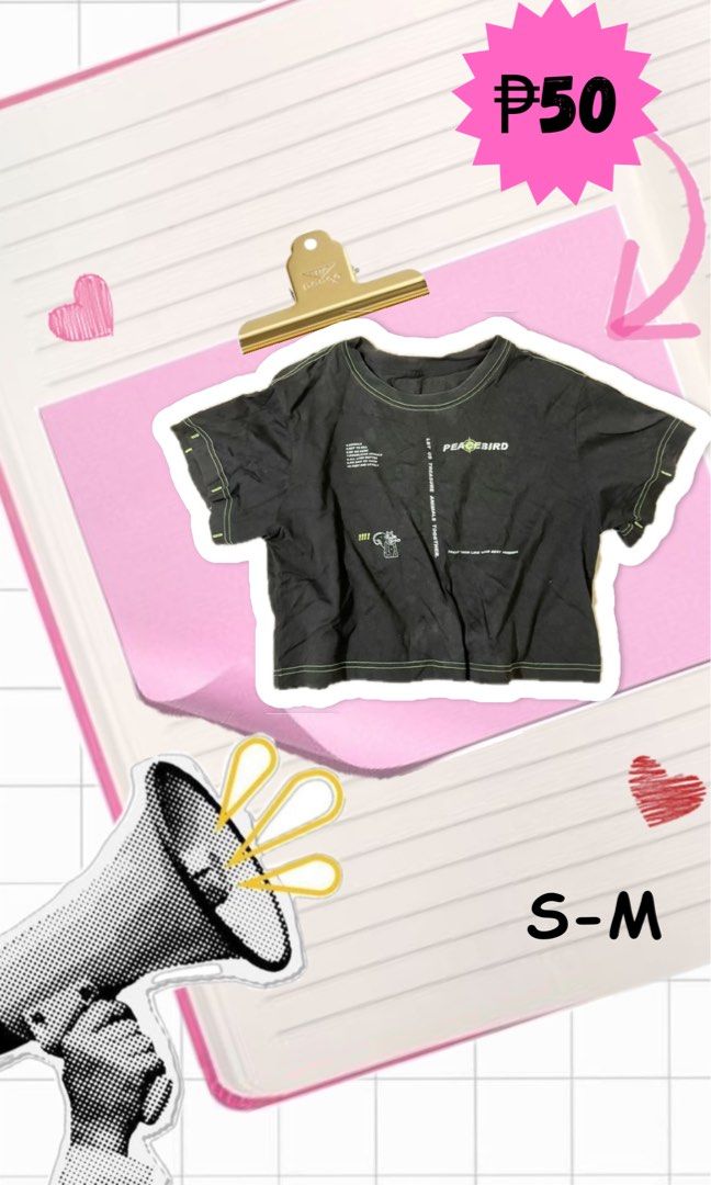 Peacebird Black Crop Top S-M (Category: Shirts) located in Echague. Submitted by reniellarose (Listing ID 1465853939, Image 1). Description: - Brand: Peacebird - Color: Black with green contrast stitching - Design: Front graphic print, short sleeves, and crew neckline - Fit: Comfortably fits sizes Small to Medium - Style: Casual daily wear, great with high-waisted jeans or skirts.