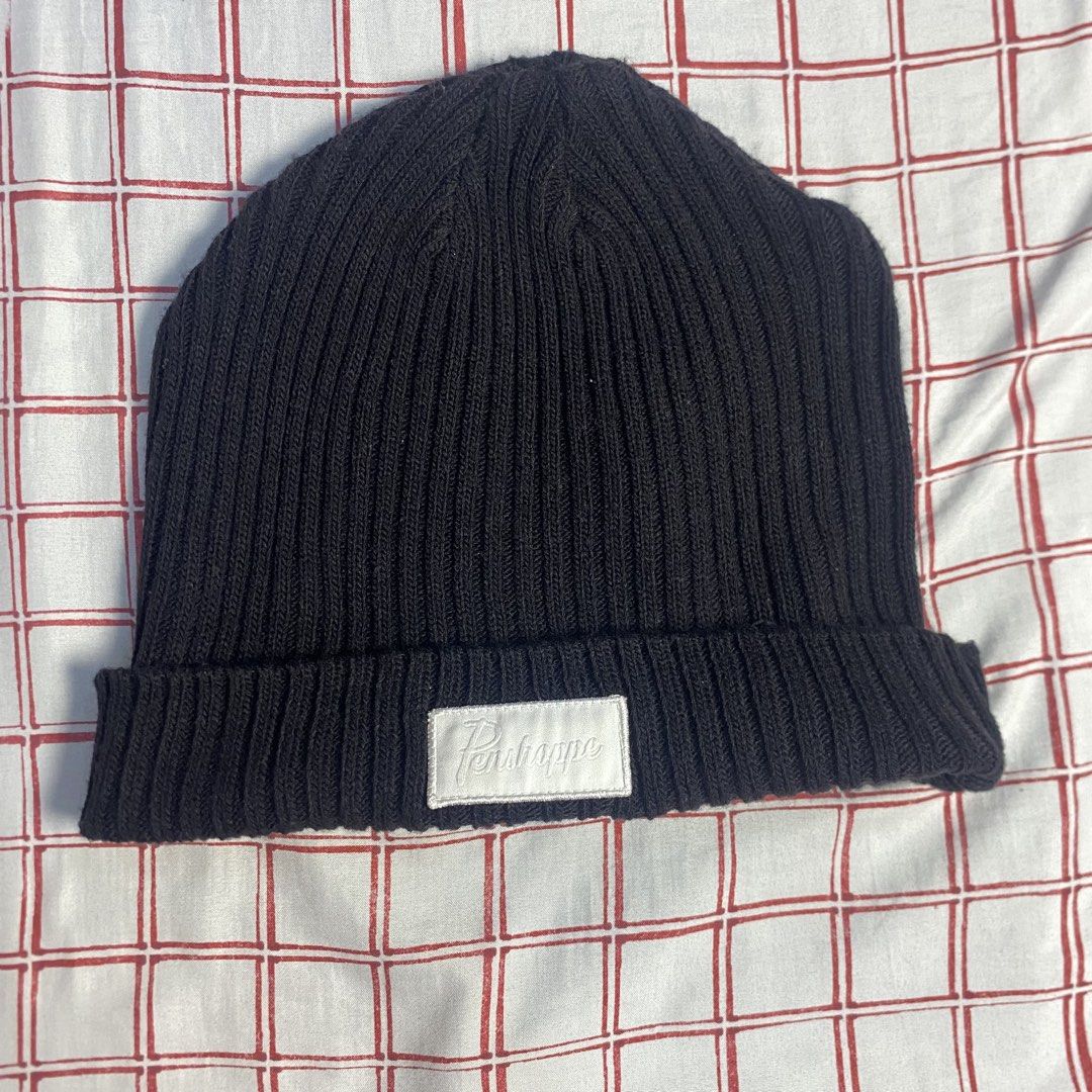 Penshoppe Black Ribbed Knit Beanie (Category: Hats & Beanies) located in Bacolod City. Submitted by stqrshel (Listing ID 1465918334, Image 1). Description: - Brand: Penshoppe - Color: Black - Material: Warm, thick ribbed knit - Design: Fold-over cuff with white embroidered logo patch - Style: Great for cold weather and casual streetwear - Condition: Excellent.