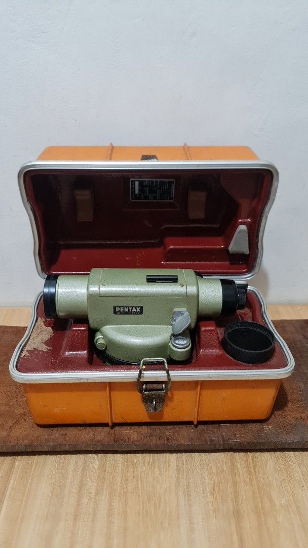 Pentax AL-3 Automatic Level Surveying Tool with Case (Category: Construction Tools & Equipment) located in Caloocan City. Submitted by royaldragon_d59aba (Listing ID 1465874210, Image 1). Description: - Brand/Model: Pentax AL-3 Automatic Level Surveyor Instrument - Serial Number: 713602 - Colorway: Olive green finish with black caps - Condition & Features: Built-in bubble level and adjustment knobs intact; heavy-duty construction ideal for constr