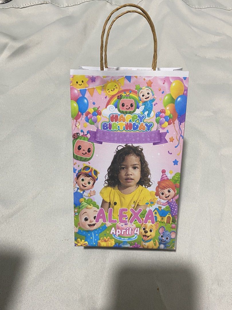 Personalized lootbags (Category: Occasions & Party Supplies) located in Pasacao. Submitted by kishhuschka (Listing ID 1465923689, Image 1). Description: - Customized paper goodie bags for kids' birthdays - Popular themes available: Cocomelon (with photo printing), Disney Cars, and Spider-Man - Features vibrant character graphics and sturdy twisted paper handles - Perfect for handing out party favors, treats, and small gifts - Multiple designs to 