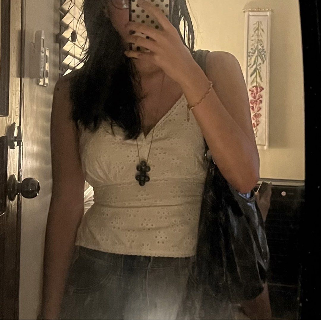 phia the label picnic top in eyelet (Category: Sleeveless) located in Marikina City. Submitted by 777stars (Listing ID 1465762983, Image 1). Description: • great condition • straps are a bit frayed from use • bust part is stitched (for more coverage) • first photo is actual when worn ! • mop: maribank / gcash • mod: jnt / lalamove.