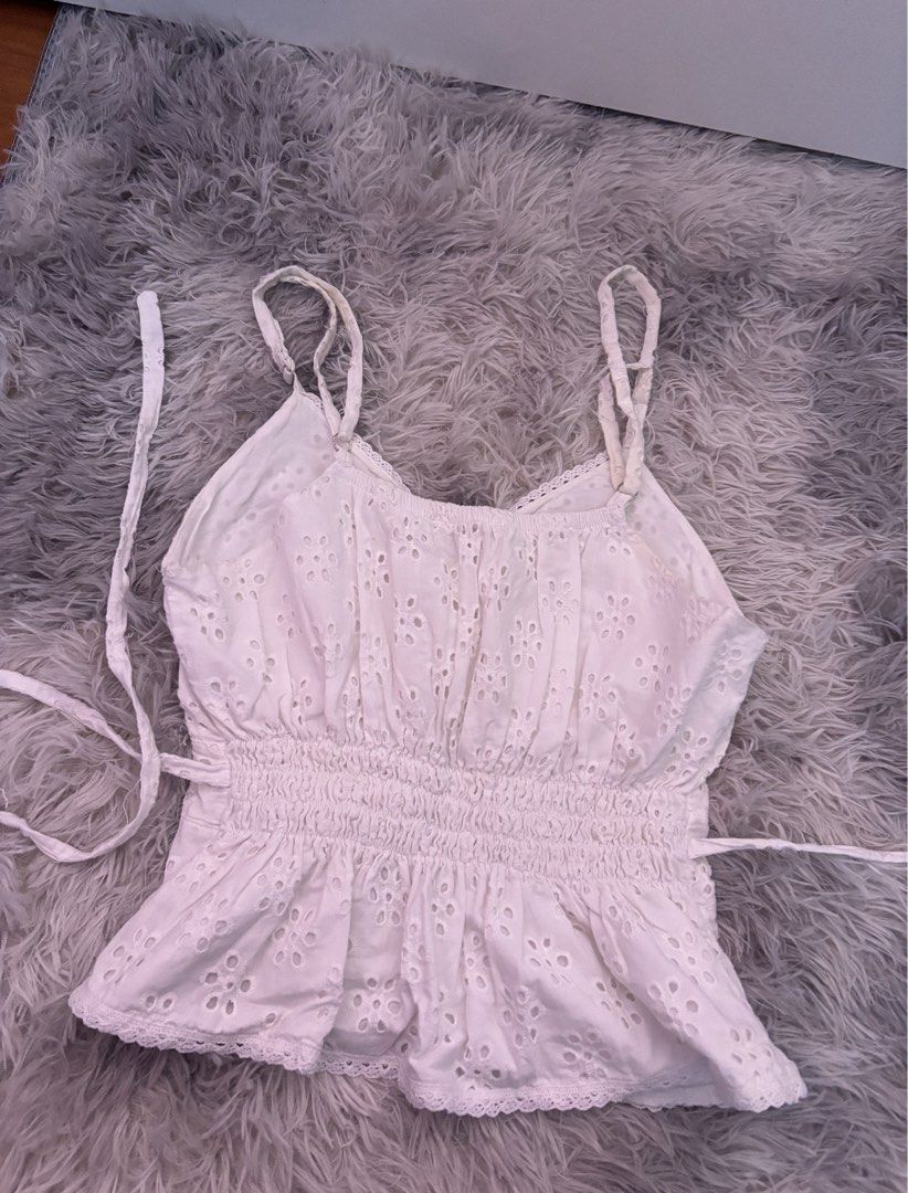 phia the label picnic top in eyelet (Category: Sleeveless) located in Marikina City. Submitted by 777stars (Listing ID 1465762983, Image 3). Description: • great condition • straps are a bit frayed from use • bust part is stitched (for more coverage) • first photo is actual when worn ! • mop: maribank / gcash • mod: jnt / lalamove.