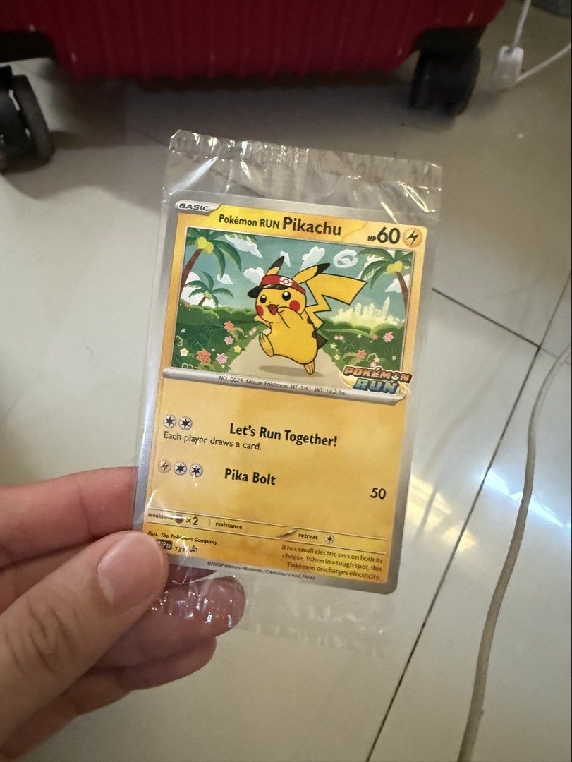 Pikachu (Category: Raw Singles) located in Quezon City. Submitted by jaimrtnznc (Listing ID 1465842126, Image 1). Description: Pokemon Run Promo Card (sealed) 7k (negotiable) Rfs: not a collector of cards.