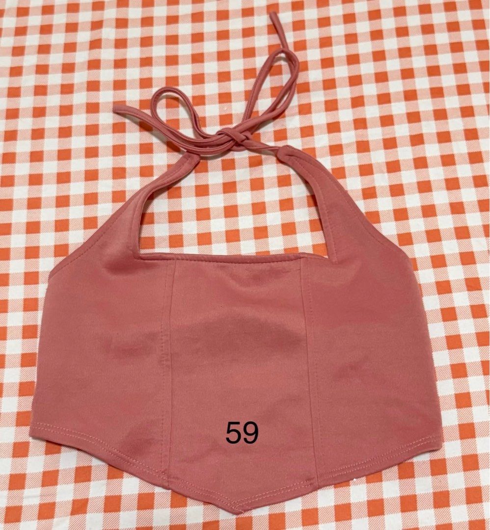 Pink Halter Top Pointed Hem Square Neck (Category: Sleeveless) located in Quezon City. Submitted by itsmesummeeer (Listing ID 1465943931, Image 1). Description: - Color: Dusty pink - Design: Square neckline with tie-back halter strap - Fit: Stretchy and super flattering - Styling: Great for casual day outs or paired with high-waisted jeans - Size: Chest - 13.5”.