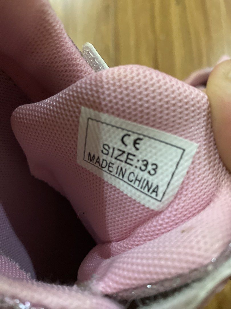 Pink LED Roller Shoes Size 33 with Wheels (Category: Babies & Kids Fashion) located in Mandaluyong City. Submitted by joytotheworld-preloved (Listing ID 1465911000, Image 3). Description: - Sparkly pink roller shoes with fun multi-color LED lights in the soles - Size: 33 - Versatile 2-in-1 design: easily attach wheels to roll or store them to walk normally - Complete set includes extra replacement wheels and mounting hardware - Comes with the ori