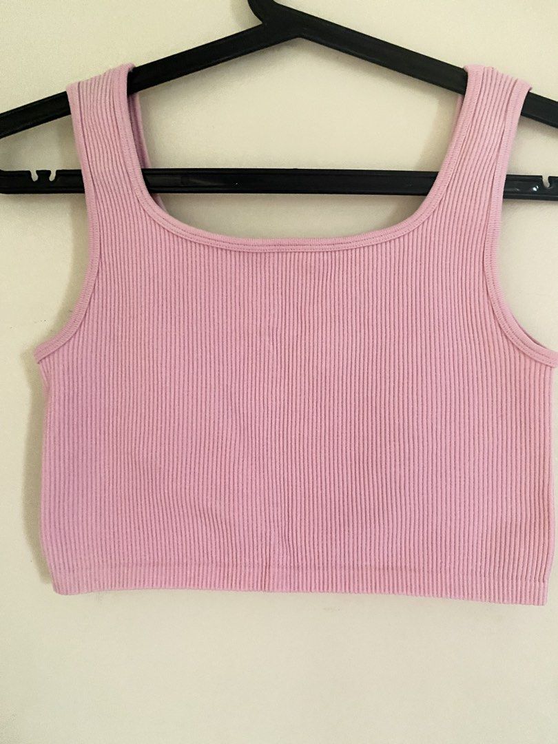 Pink Ribbed Crop Top Tank (Category: Sleeveless) located in Quezon City. Submitted by abssnf (Listing ID 1465857893, Image 1). Description: - Color: Pink - Style: Ribbed tank top with square neckline and thick straps - Fit: Cropped length, stretchy material - Condition: Excellent, no stains or pulls - Perfect everyday basic.