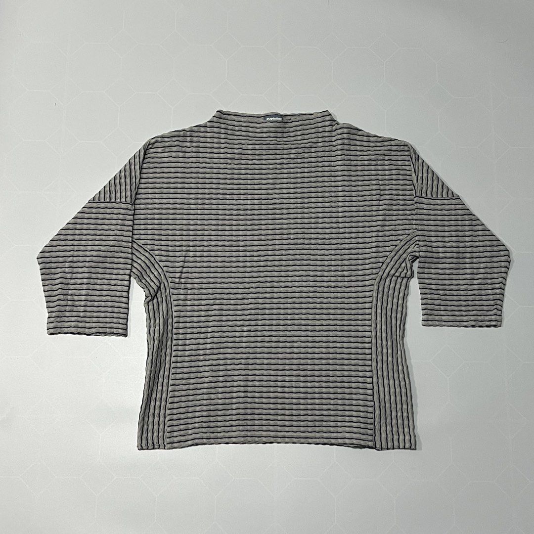 Plantation Grey Black Striped Textured Top (Category: Blouses) located in Caloocan City. Submitted by lostarchive_55 (Listing ID 1465915406, Image 1). Description: - Brand: A-net Inc. (Made in Japan) - Color/Pattern: Plantation grey and black striped - Size: Medium (M) - Material: 77% cotton, 23% polyester (lightweight, stretchy textured fabric) - Design: Boat neckline, 3/4 sleeves, relaxed boxy cut, and vertical ribbed side panels.