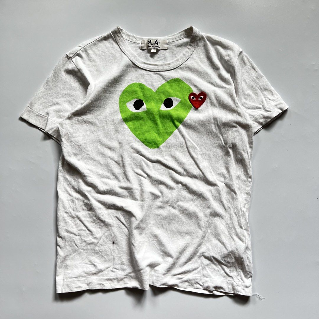 Play By Comme Des Garcons Two Heart Shape Tee (Category: Shirts) located in Makati City. Submitted by merto_side (Listing ID 1465827076, Image 1). Description: Play By Comme Des Garcons Two Heart Shape Tee Dimes:W19xL23 Issue:ink point Complete papers ₱450 +Shipping fee.