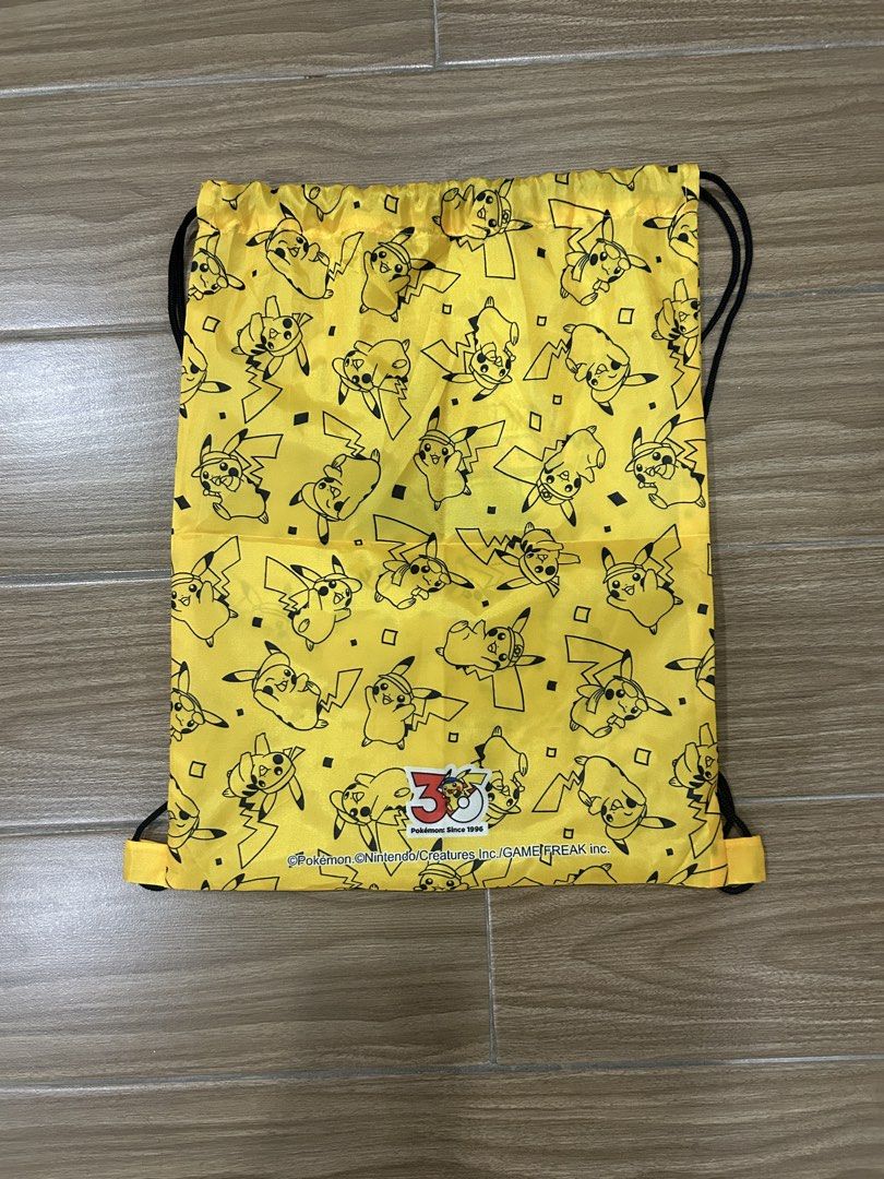 Pokemon RUN PH Merchandise Set (Category: J-Wave Merchandise) located in San Juan City. Submitted by curatedbymae (Listing ID 1465894352, Image 3). Description: Pokemon RUN 30 PH Merchandise Set - Pokémon RUN T-shirt (Uniqlo drifit) - Small - Pikachu drawstring bag - Pokemon design running cellphone armband - Pokémon RUN canvas tote bag - Official Pokemon Badge Pin RFS: not a collector Mode of payment: GCASH/MAYA Shipping: Grab/Lalamove/J&T (Buye