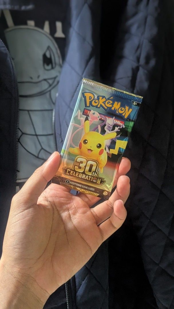 Pokémon 30th Celebration Booster Pack English (Category: Card Packs) located in Quezon City. Submitted by verminlis (Listing ID 1465852133, Image 1). Description: FS: Pokémon TCG 30th Celebration Booster Pack Brand new / factory sealed 5 cards per pack Received from Pokémon RUN Philippines 2026 Never opened Can provide additional photos/videos for serious buyers. MOP: GCash / Bank Transfer MOD: Lalamove / Grab / LBC / J&T Shipping fee shouldered 